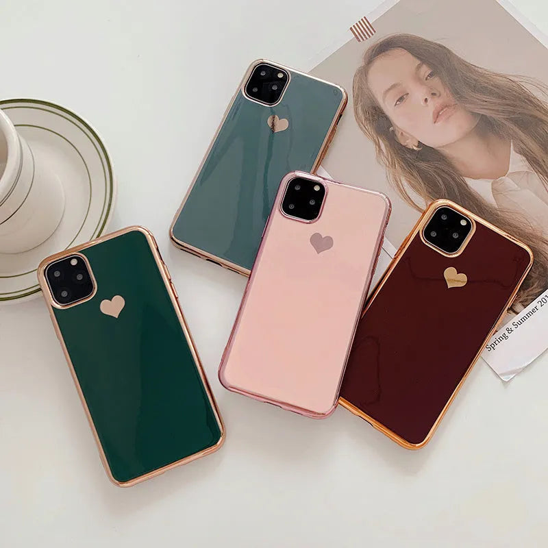 Simple solid colour TPU back cover case for iPhone on a table, shown in Blue.