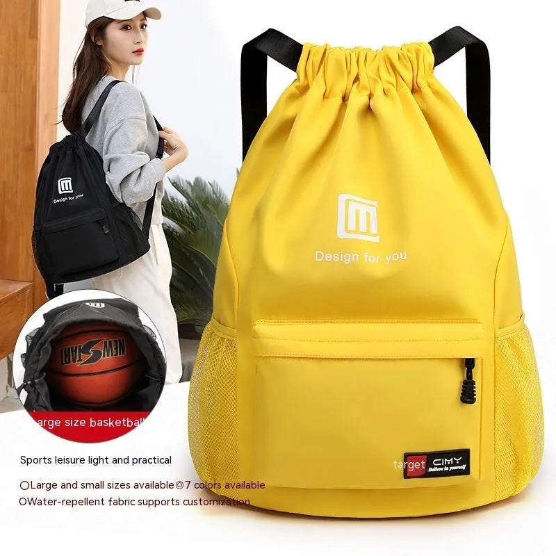 Oxford cloth travel backpack in black with double shoulder straps and drawstring closure