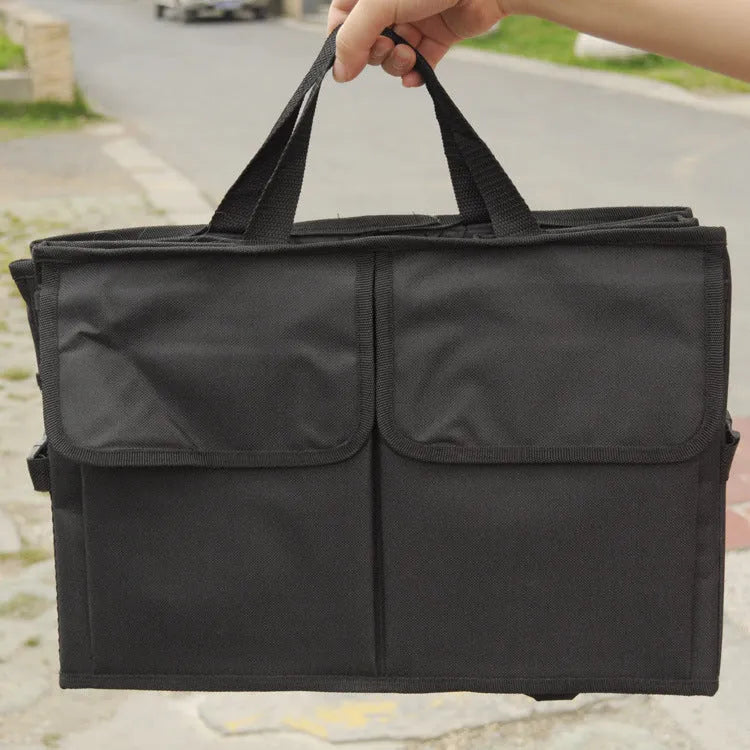 Black foldable car storage organiser in non-woven material, 40cm x 26cm folded size, for packages and shopping