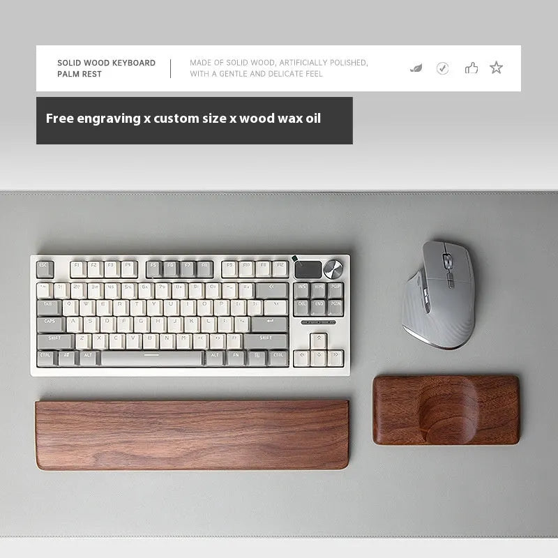 Black walnut wooden keyboard palm rest with wrist strap, 440mm long, on a desk