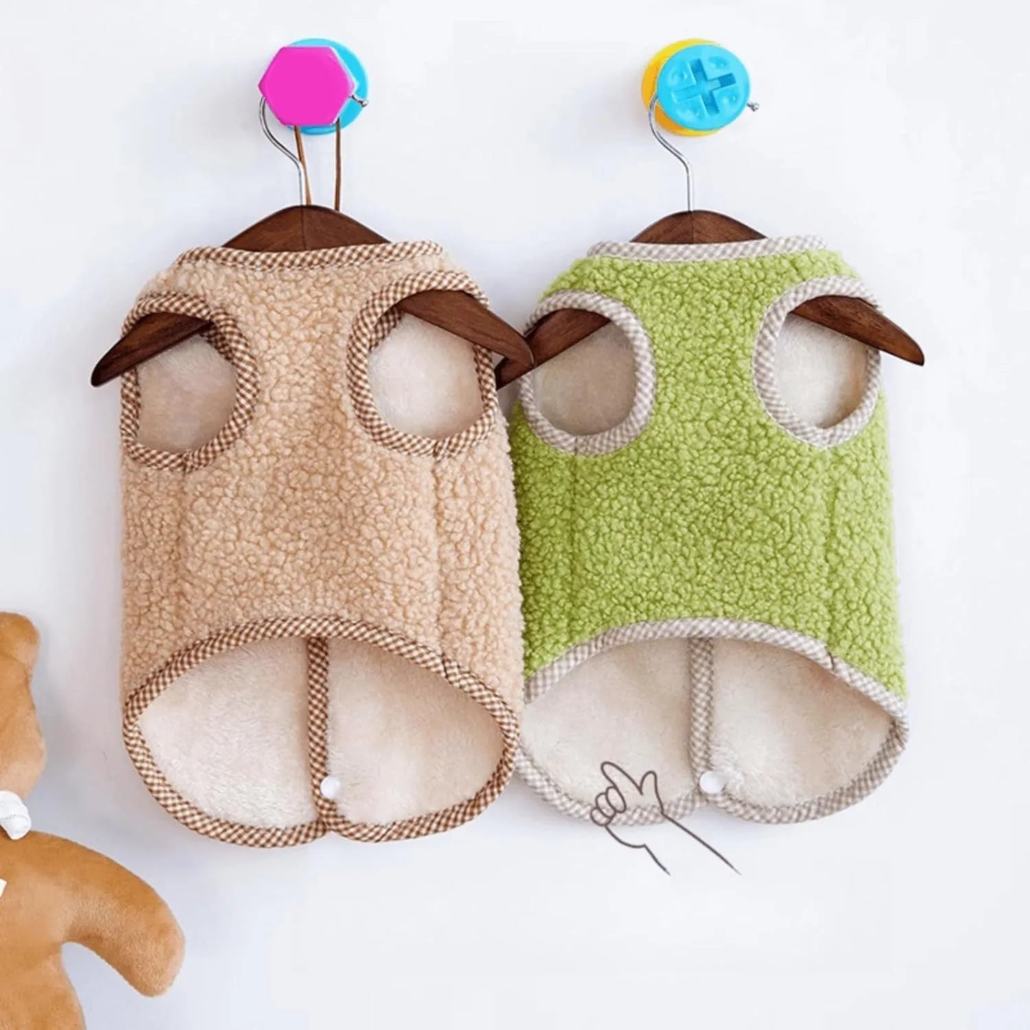 Green coral fleece dog sweatshirt vest on a small dog, showing the collar leash ring.