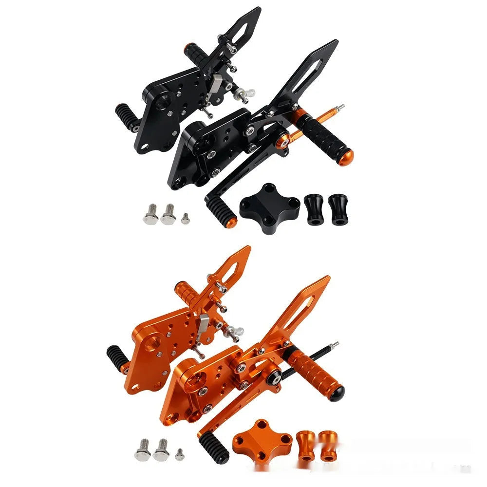 KTM Duke motorcycle pedal support assembly in black and orange for 125 200 250 390 models