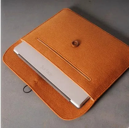 Grey felt laptop sleeve compatible with MacBook Air and Pro 13 to 16 inches
