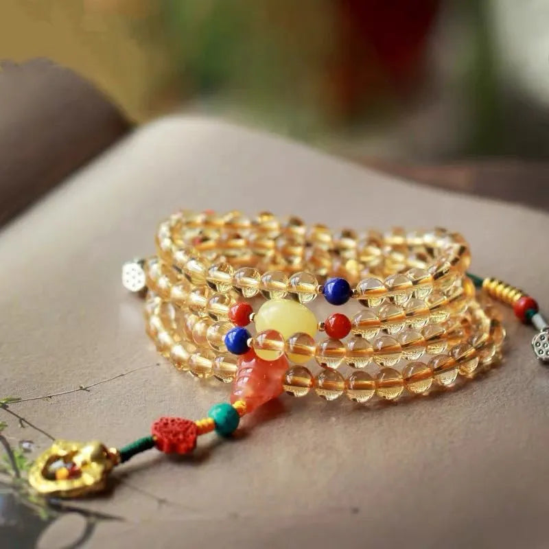 Brazil natural citrine bracelet with 1mm yellow beads on filament string