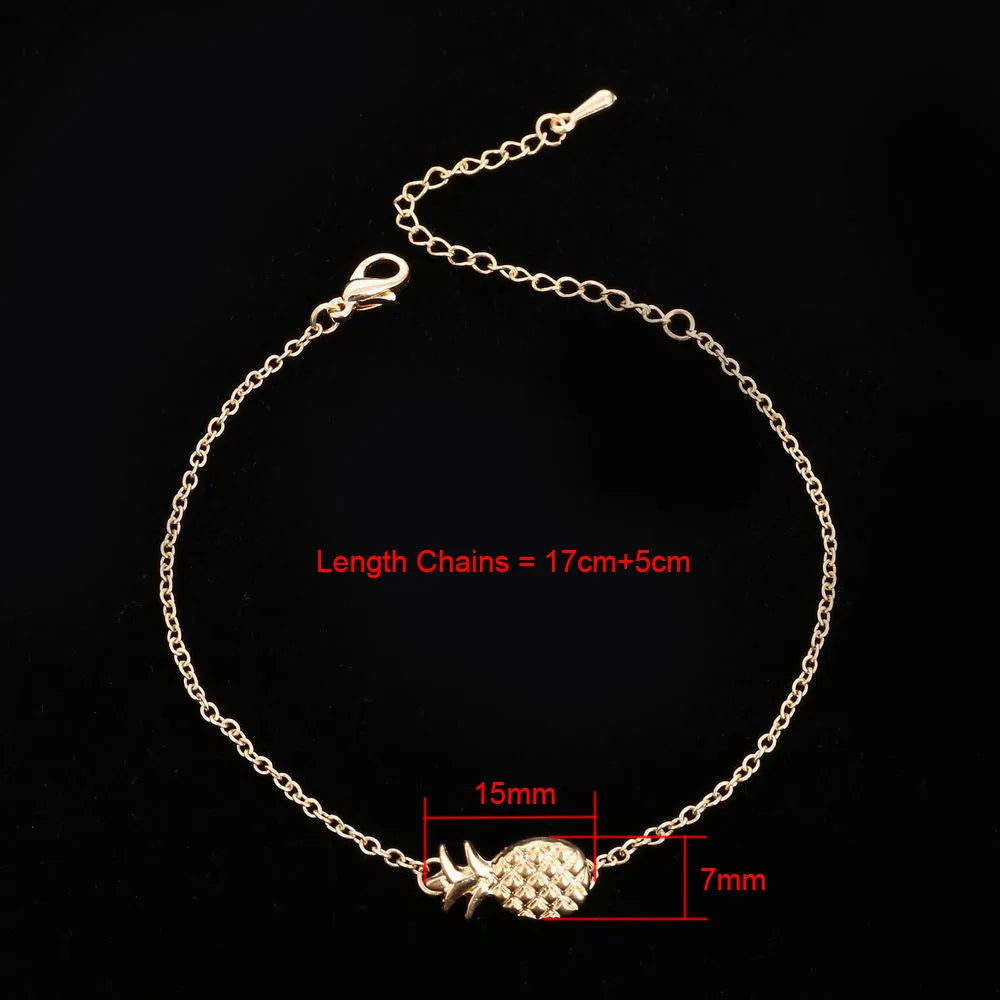 Women's alloy bracelet with a simple pineapple charm in a choice of gold or silver metallic finish.