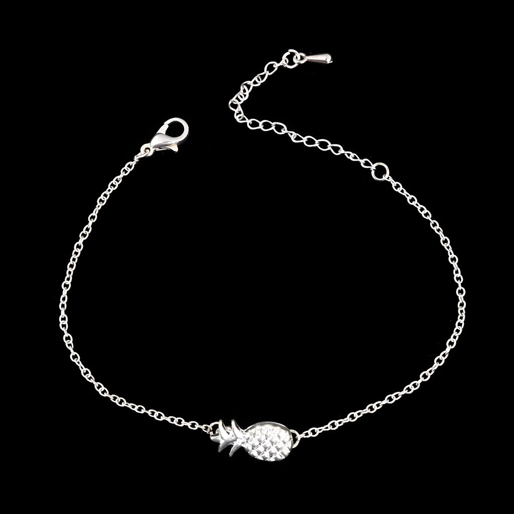 Women's alloy bracelet with a simple pineapple charm in a choice of gold or silver metallic finish.