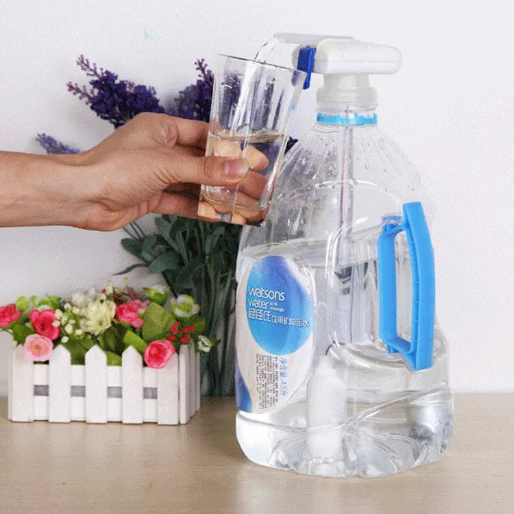 Electric beverage pump with blue silicone straws and a white press handle on a table.