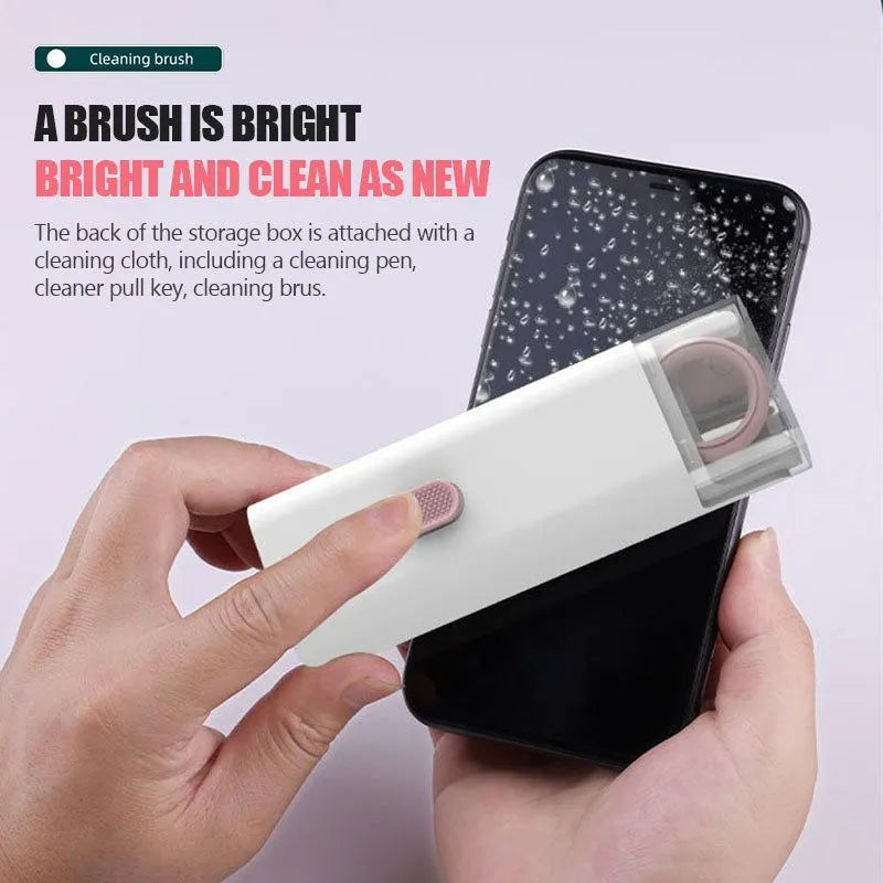 White multifunctional electronic cleaning kit with foldable pen, retractable brush, keycap puller, and spray bottle.