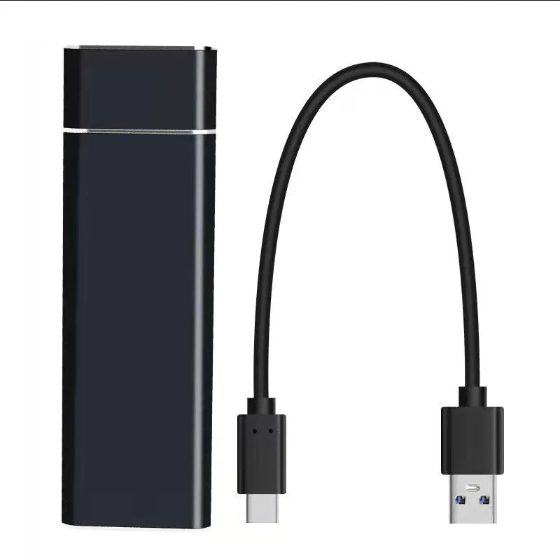 Ultra-thin silver metal external hard drive with data cable on a desk.