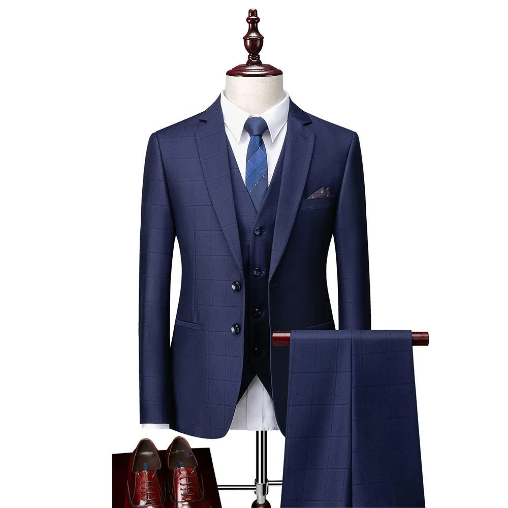 Men's navy blue slim fit three-piece suit with cotton blend fabric for business casual occasions