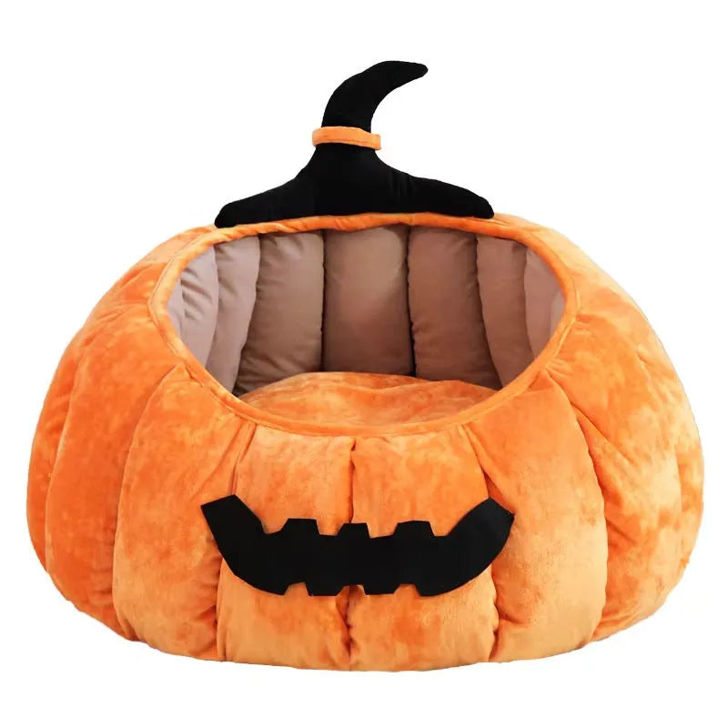 Orange Halloween pumpkin-shaped soft plush cat bed with a cartoon devil face design.