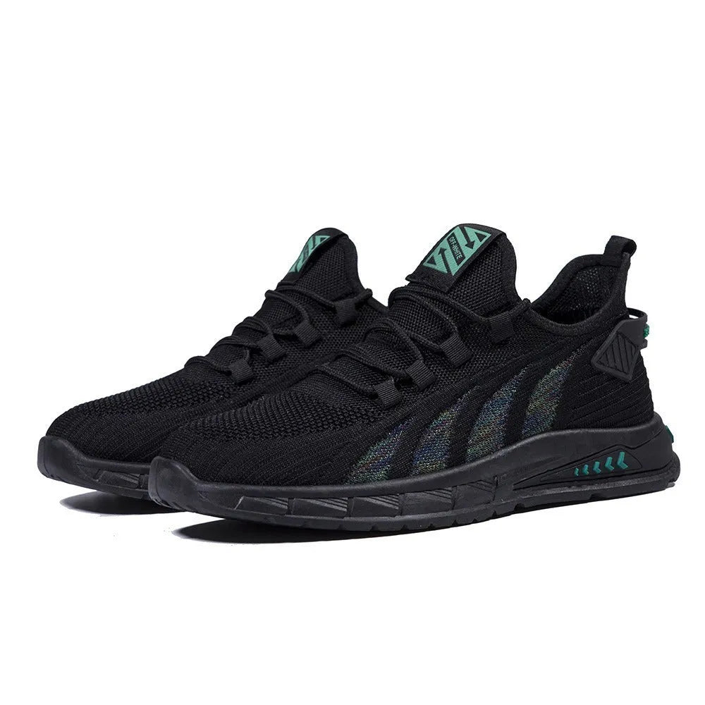 Lightweight low-top sneaker in mesh with stripe pattern and flat plastic sole.