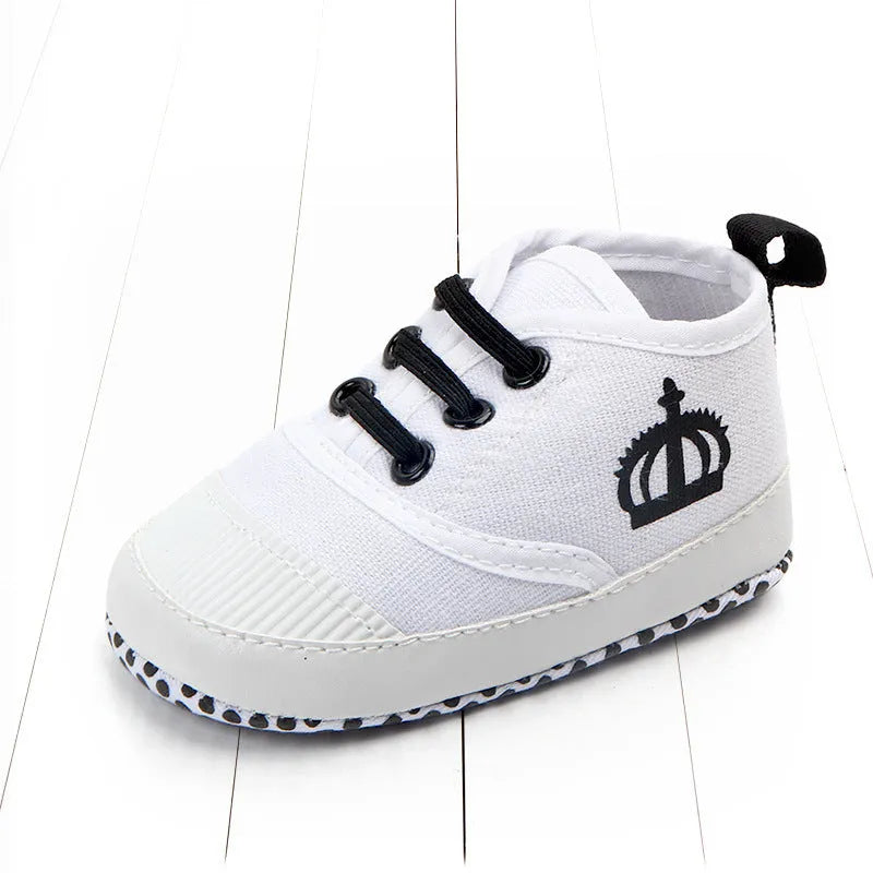 Red and white canvas toddler shoes with elastic band closure in three size options