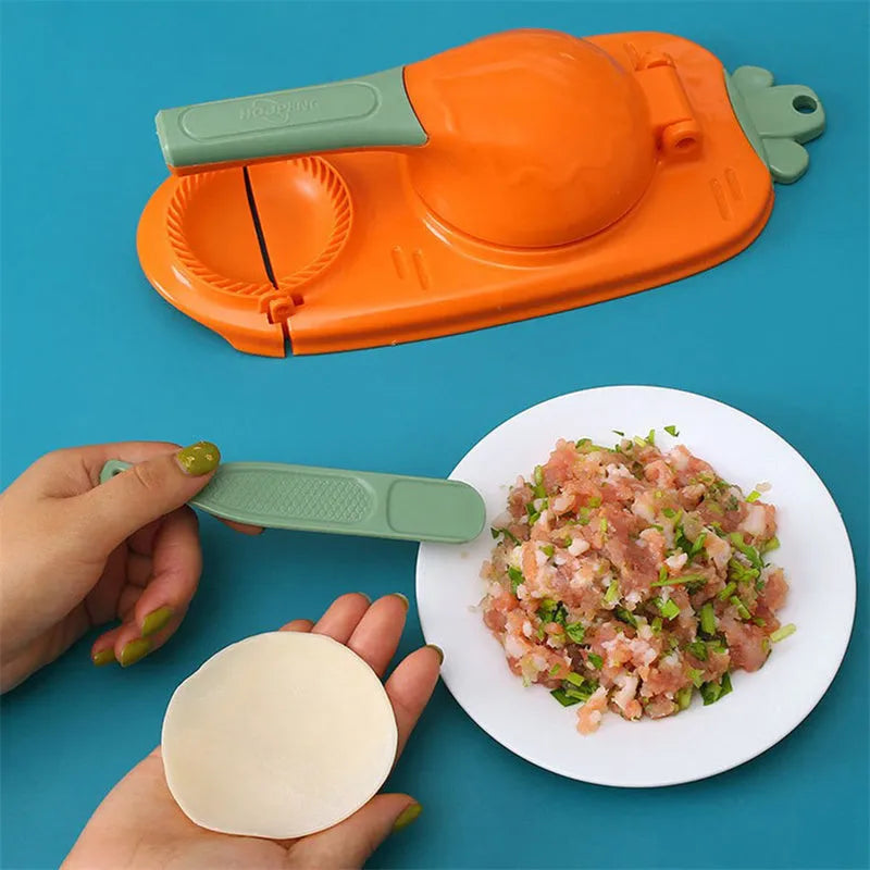 Orange and white plastic dumpling maker tool with ergonomic handle and hanging hole