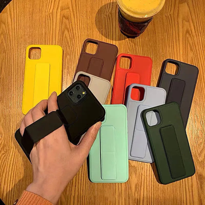 Leather wrist phone case for iPhone in black with TPU rear cover and wrist band