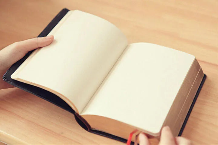 Large thick leather Phnom Penh notebook in A6 size with gold cover and 480 pages of writing paper