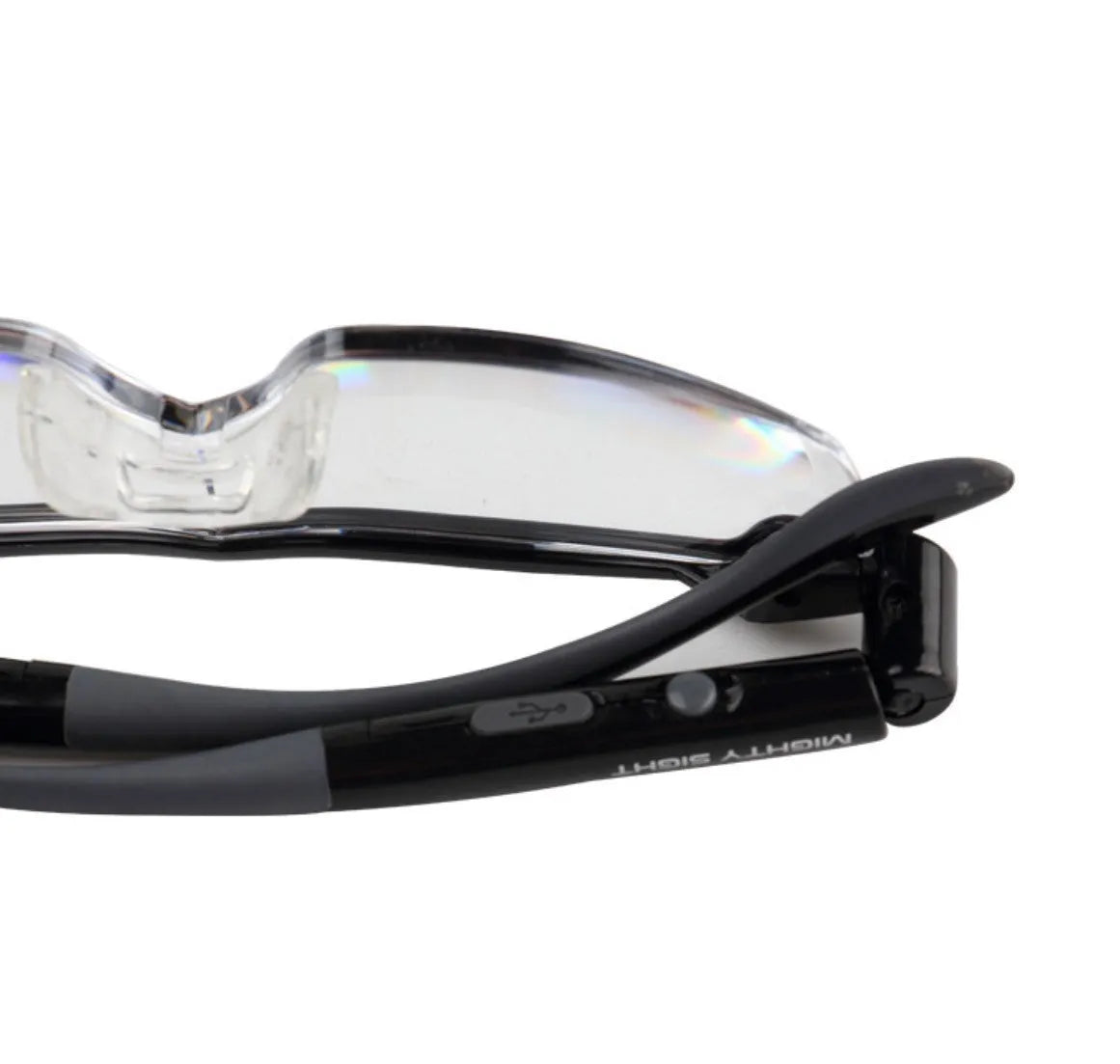 Transparent black USB LED reading glasses with scheduled light control on desktop