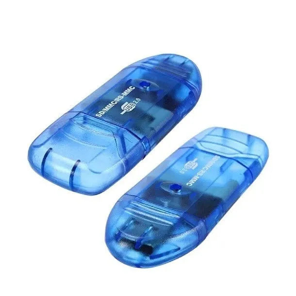 Transparent plastic USB card reader with optional LED light on a desk.
