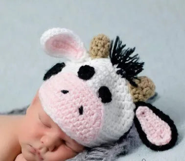 Hand-knitted white baby cow suit with matching hat for 0-3 month newborns