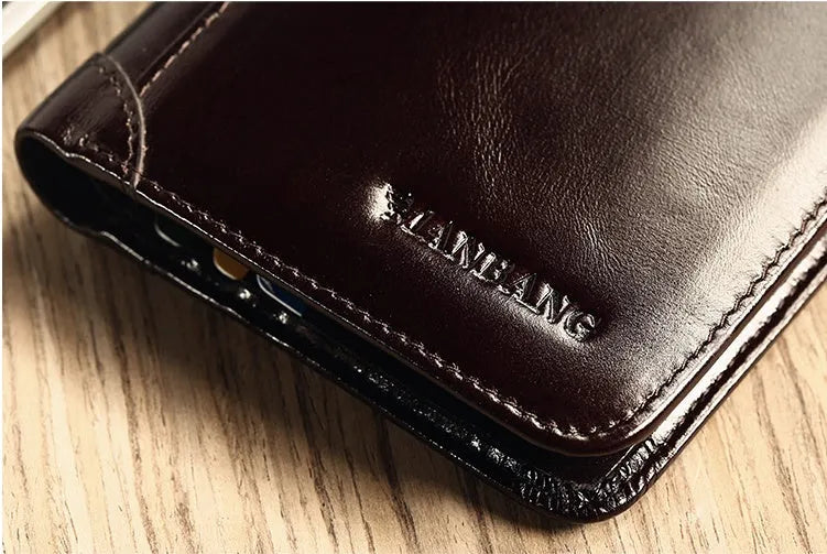 Men's brown leather bifold wallet open to show photo slot, card slots, billfold, and coin pocket.
