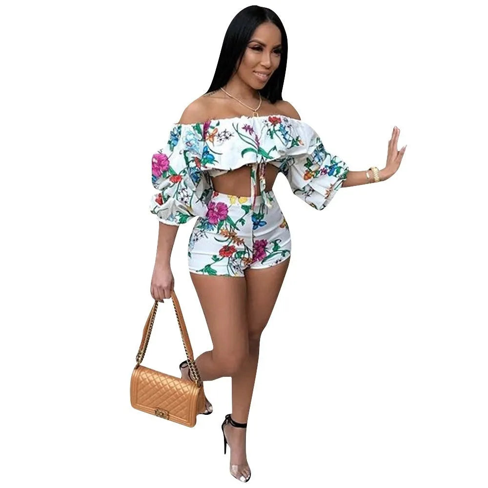Multicolour digital print women's two-piece outfit with pile sleeve top and matching shorts.