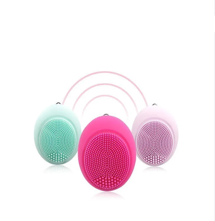 Ultrasonic electric face wash brush in pink for deep pore cleansing with vibration technology