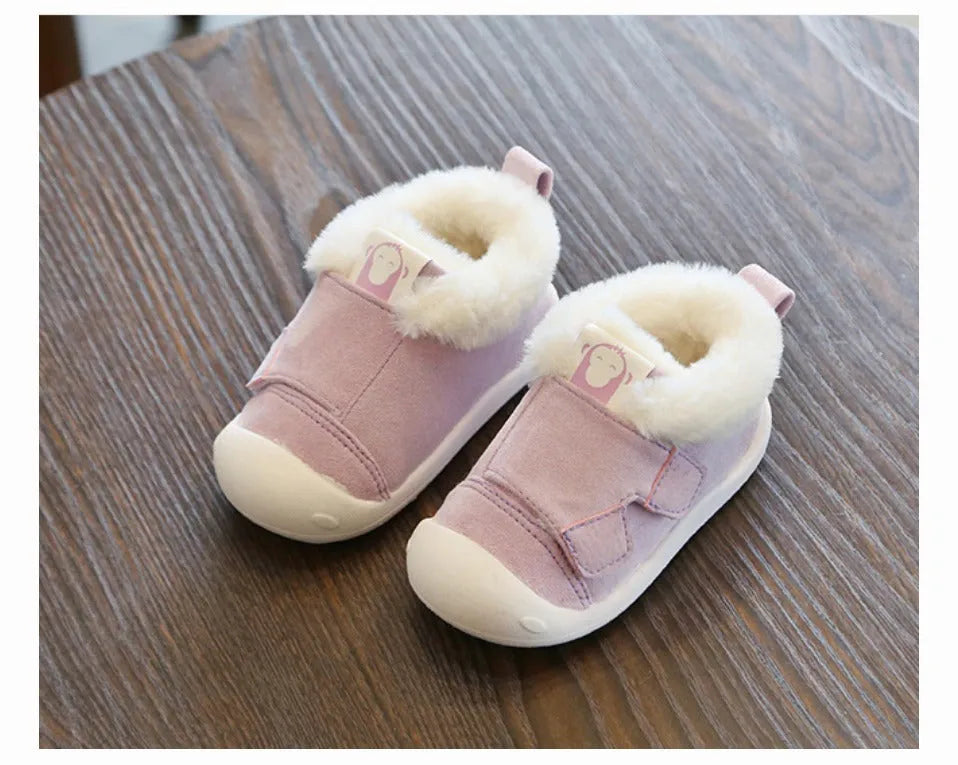 Children's velvet toddler shoes in various colours, showing non-slip sole and soft upper.
