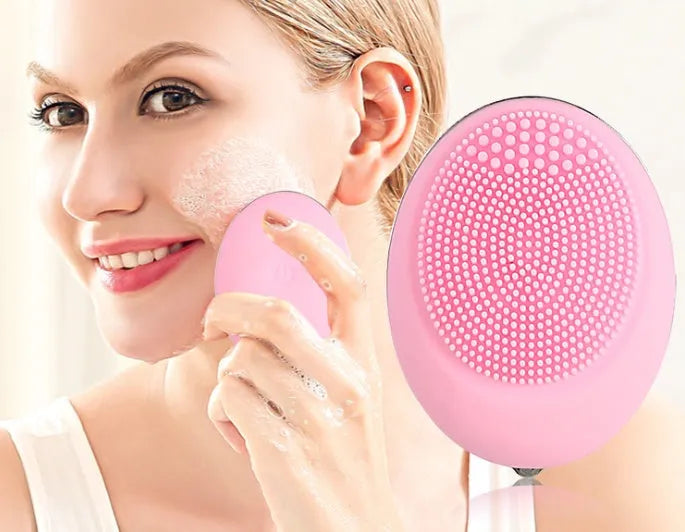 Ultrasonic electric face wash brush in pink for deep pore cleansing with vibration technology