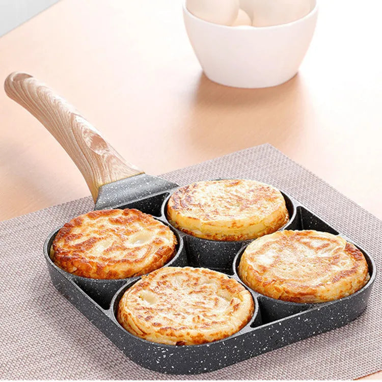 Non-stick aluminium egg dumpling frying pan with four round holes for cooking breakfast burgers or dumplings