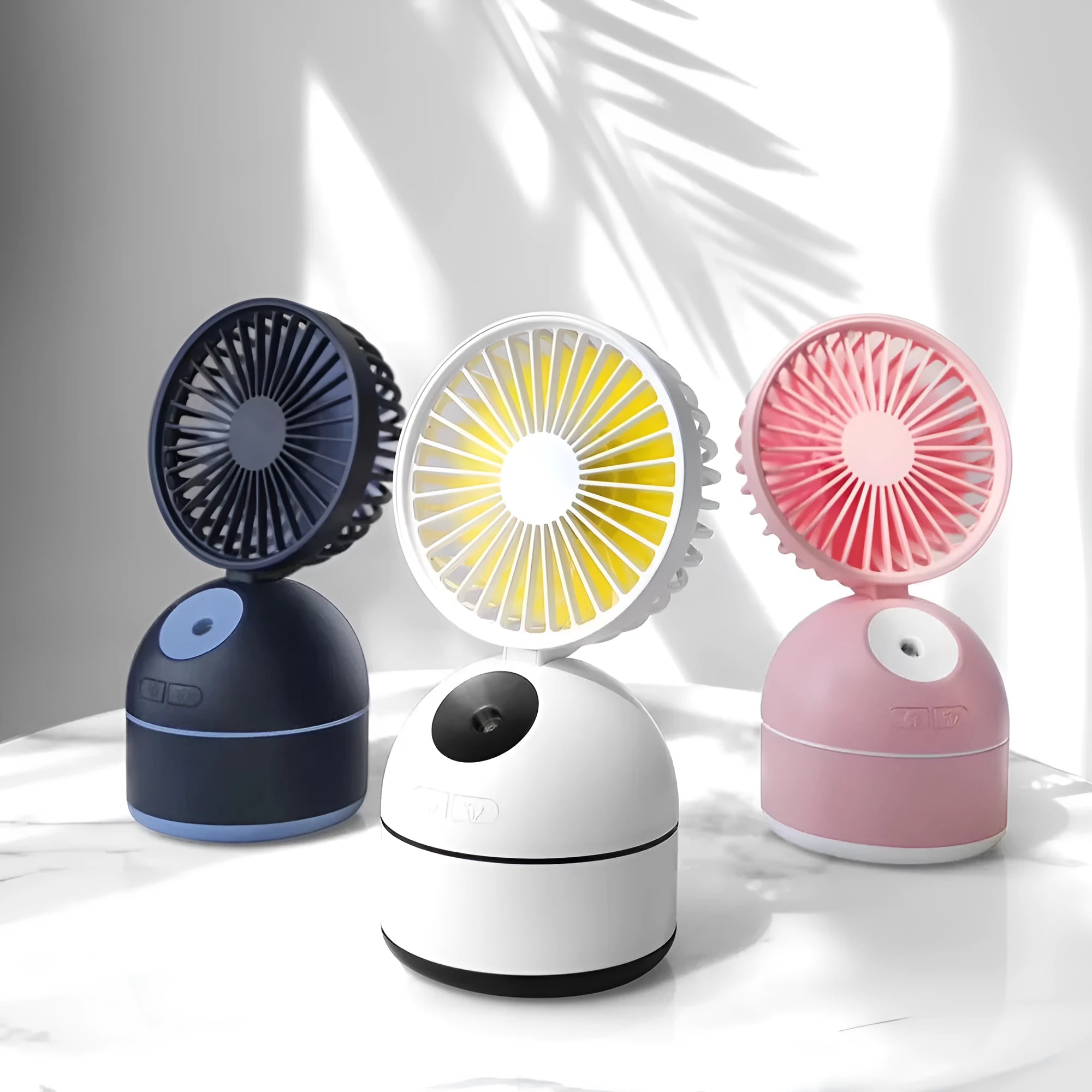 Mini USB fan humidifier in white, side view showing fan blades and mist nozzle