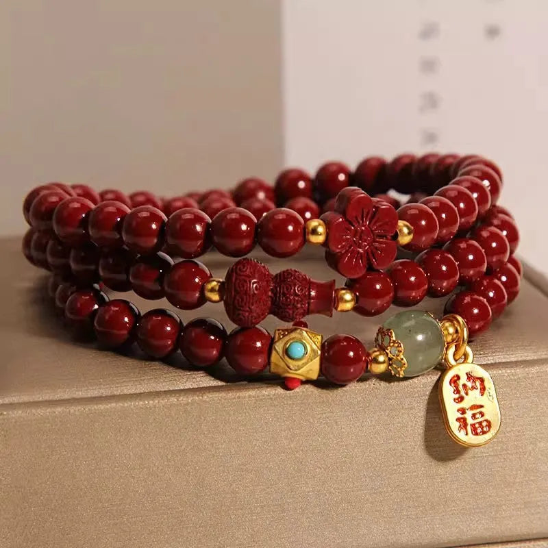 Red cinnabar bracelet with multi-circle gourd and five-petal flower geometric design