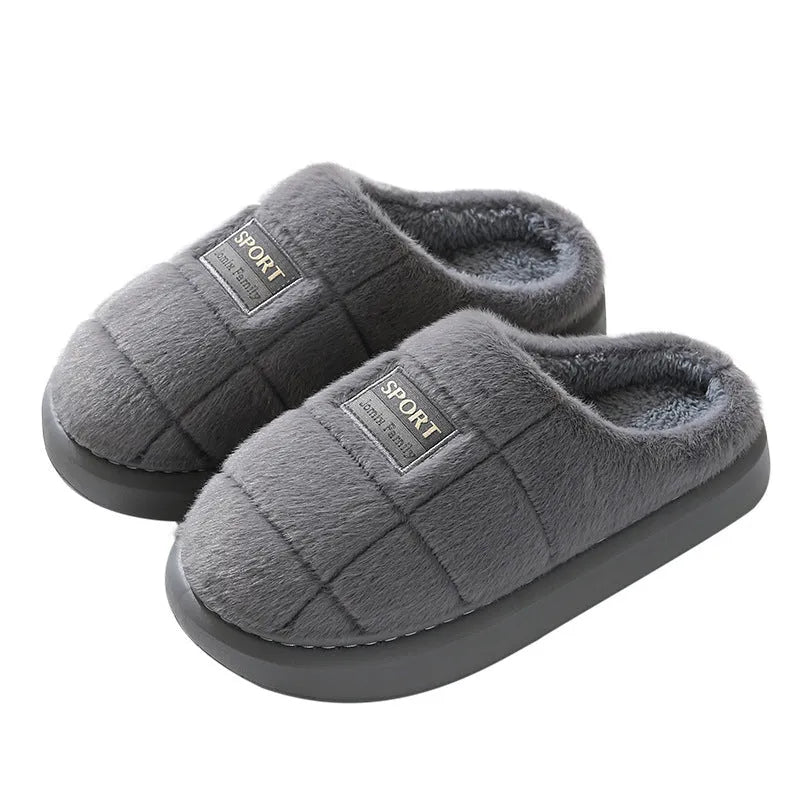 Grey and brown plaid men's winter slippers with thick sole and wool lining.