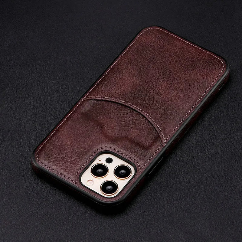 Dark blue PU leather protective case for an iPhone on a table.