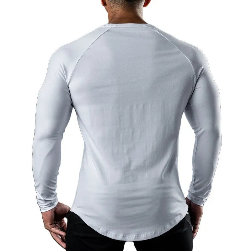 Men's fitted long sleeve cotton sports t-shirt in Army Green, shown on a model.
