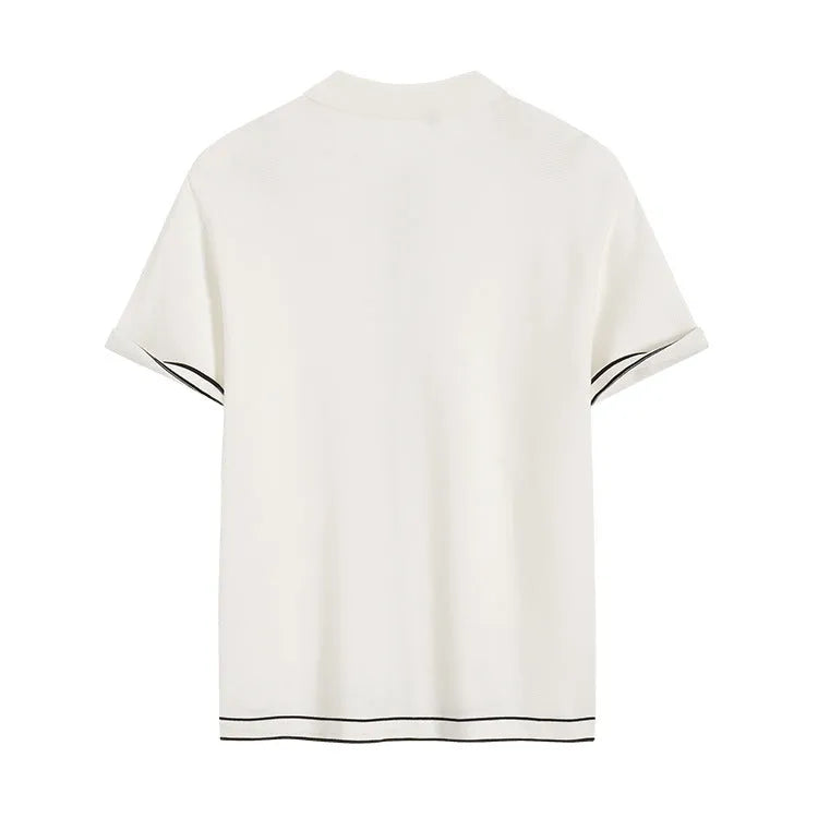 White short sleeve women's cardigan with a dark contrast lapel collar, shown open front.