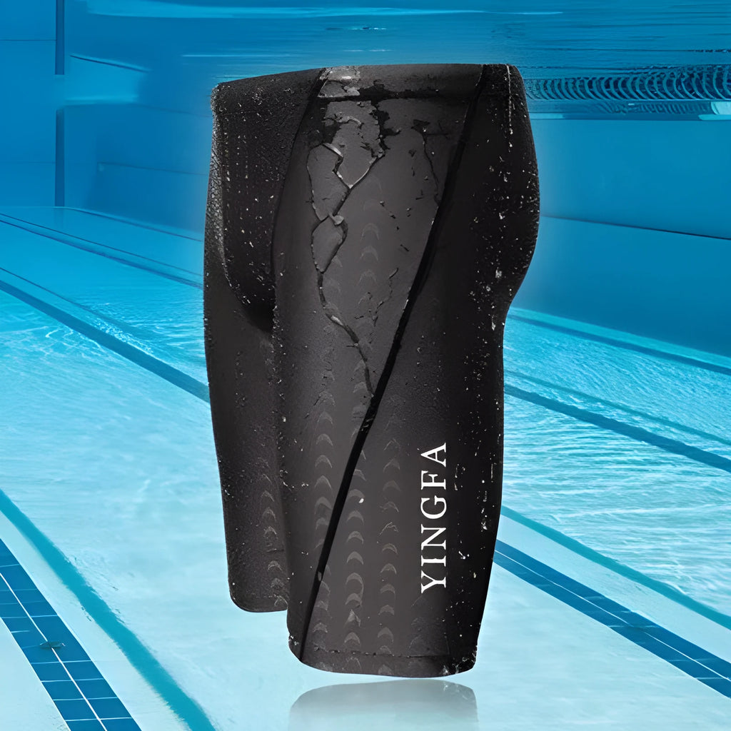 Kids race training swim trunks in black polyester spandex, front view, sizes XS to 3XL