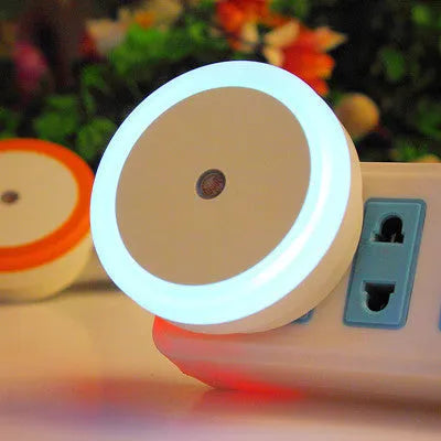 Round halo-shaped LED induction nightlight in blue, showing 18 small LED beads around its ring.