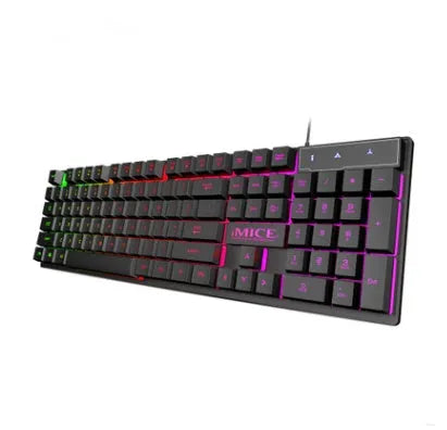 Black USB wired gaming keyboard with luminous backlit keys on a desk.