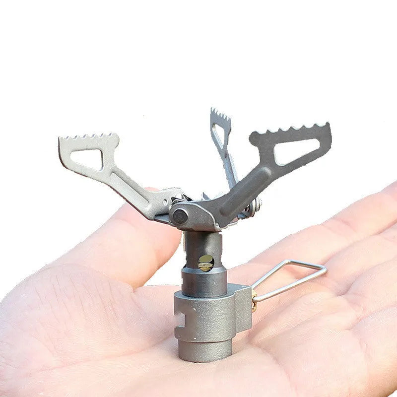 A portable propane gas camping stove with a one-piece metal furnace structure.