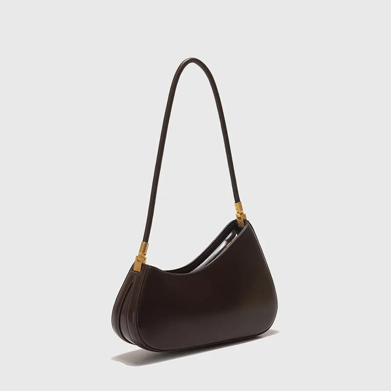 Women's retro oval underarm bag in PU leather available in seven colours with internal zipper organiser