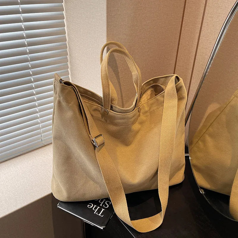 Large capacity women's casual tote bag in khaki cloth with polyester lining, sandwich pocket, and mobile phone bag