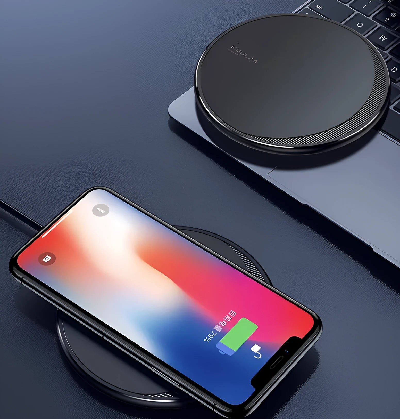 Black Kuulaa KL-CD16 wireless charging disc for mobile phones on a surface