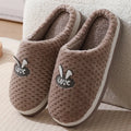 Women's rabbit plaid design artificial fur slippers with a thick rubber sole in various colours.