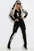 Black women's casual suit with wings printing, featuring zip-up hooded top and matching trousers