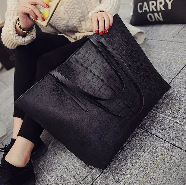 Simple European fashion shoulder bag with adjustable strap in black or grey colour