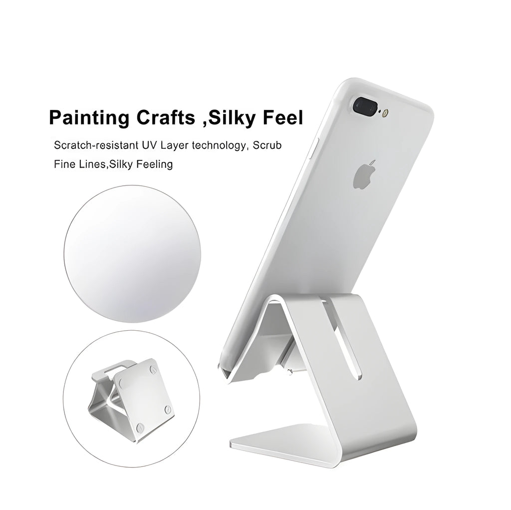 Aluminium alloy foldable tablet stand in gold holding a smartphone on a desk