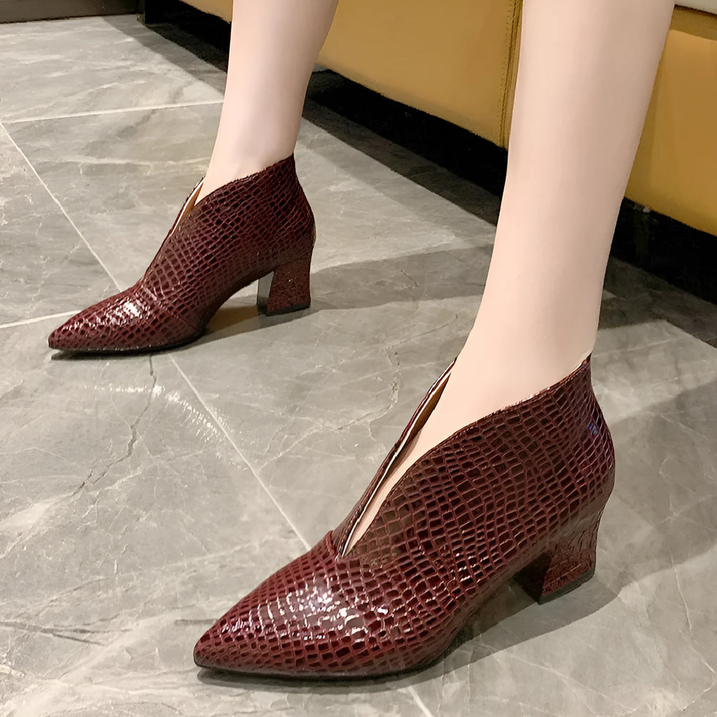 Women's black V-cut ankle boots with pointed toe and chunky 6-8 cm heels, embossed artificial PU upper