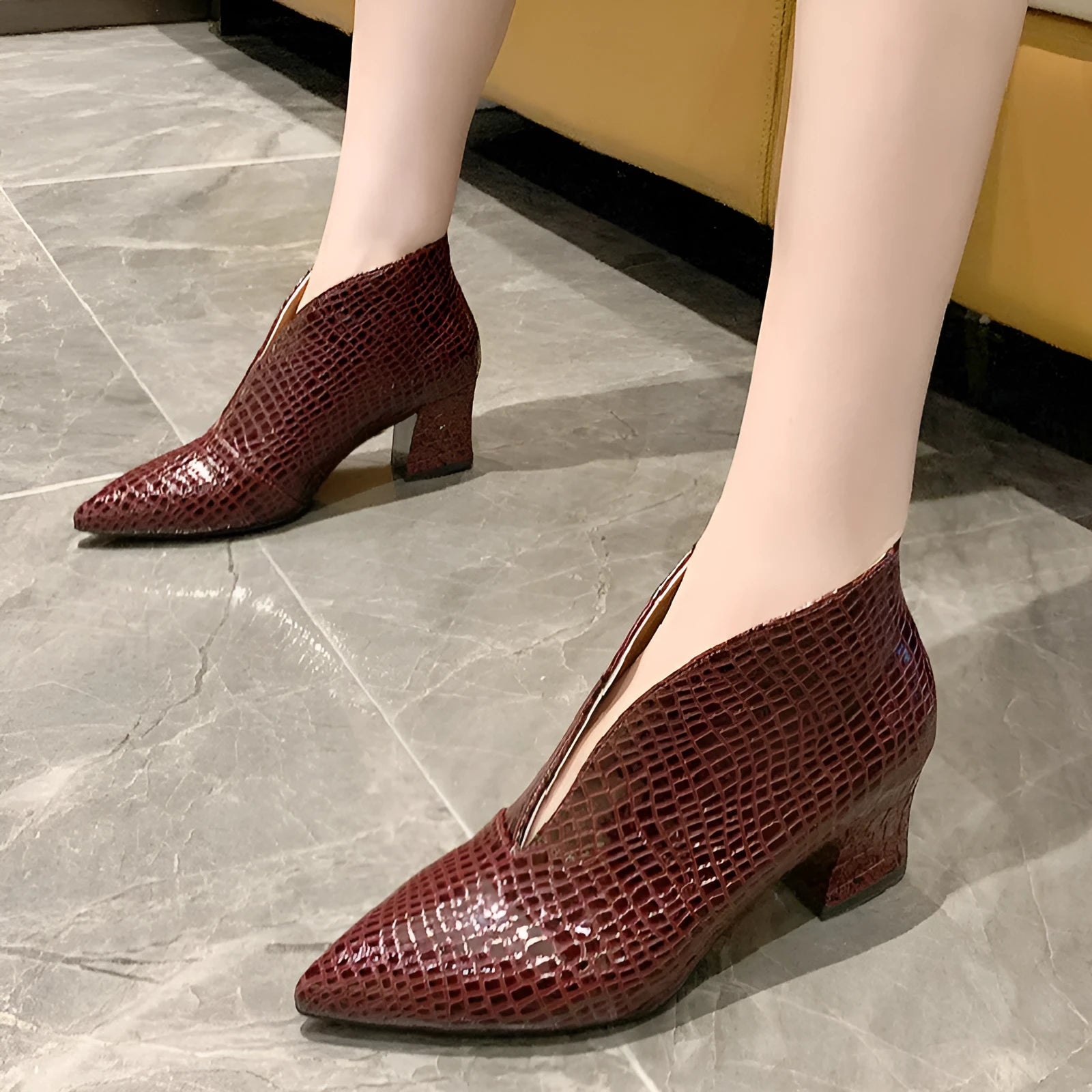 Women's black V-cut ankle boots with pointed toe and chunky 6-8 cm heels, embossed artificial PU upper