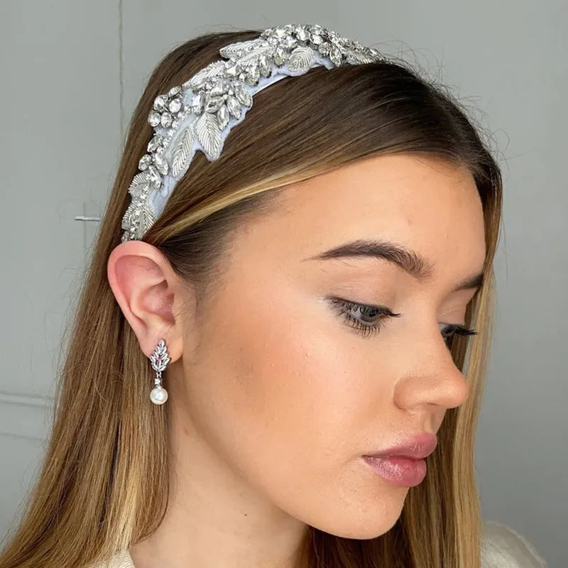 Geometric flower design earrings with micro inlaid zircon and pearl accents in gold, platinum, and rose gold plating.