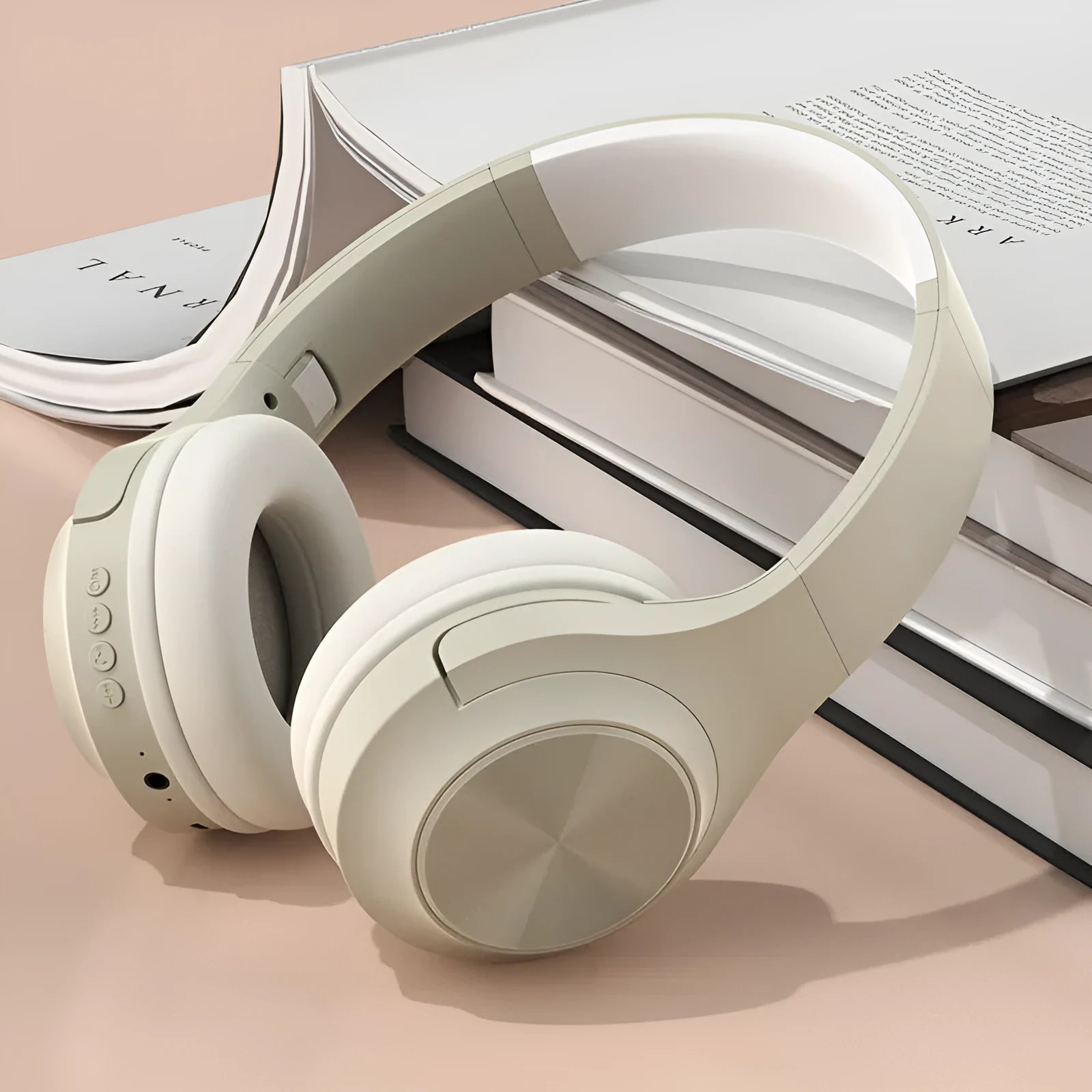 Wireless Bluetooth headphones in chalk black, ivory white, and youth green colours with creative design